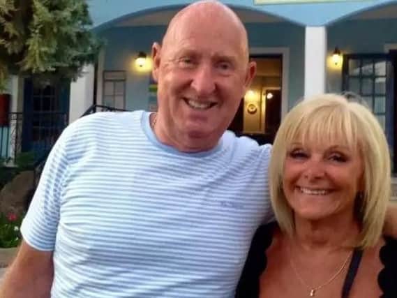 Family and friends said an emotional farewell to Burnley couple John and Susan Cooper at their funeral today.