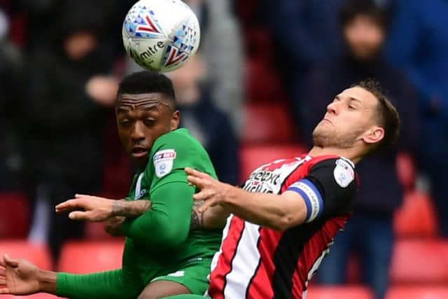 Sheffield United striker Billy Sharp in action against PNE right-back Darnell Fisher