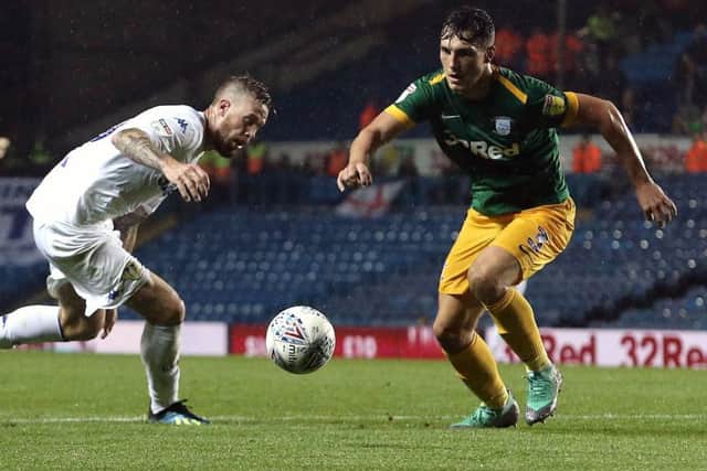 The left back battles with Pontus Jansson during PNE's defeat at Leeds