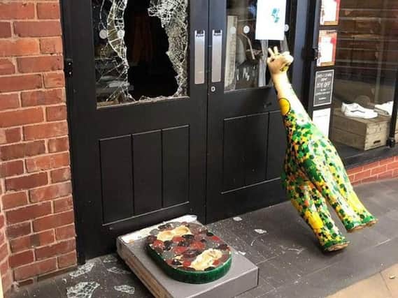 The giraffe sculpture, called Dotty, that was used as a battering ram during a suspected burglary on a shop in High Street, Worcester. Photo credit: West Mercia Police/PA Wire