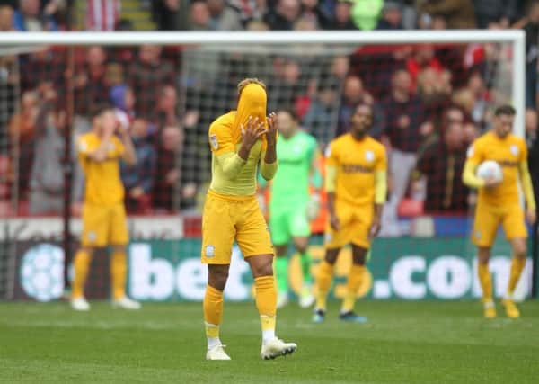Preston North End's players in despair after Sheffield United's third goal