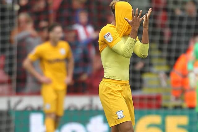 Callum Robinson covers up his frustration