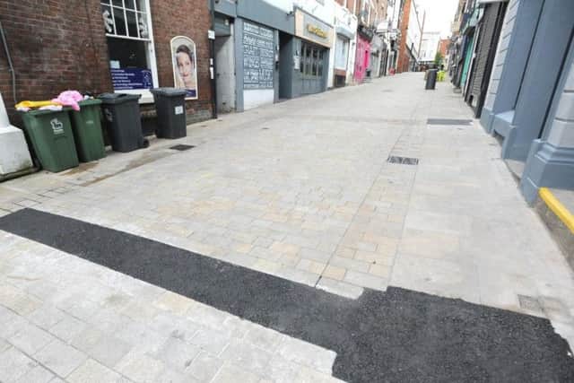 The unsightly asphalt on Cannon Street