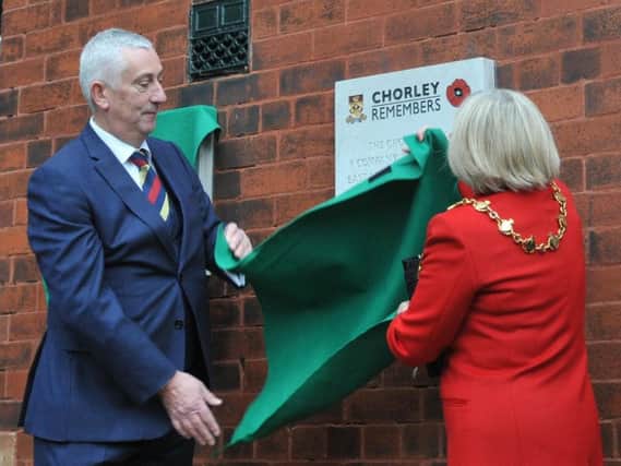 Sir Lindsay Hoyle MP and the Mayor of Chorley Coun Margaret Lees unveil the plaques, after a march through Chorley town centre to the Army Reserve Centre in the town (Photos/Video: Johnston Press)