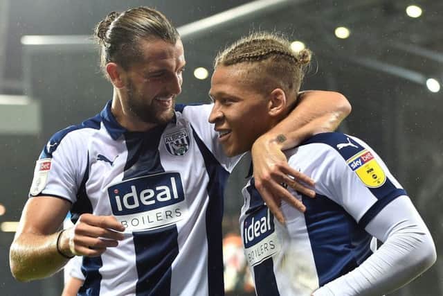 WBA strikers Jay Rodriguez and Dwight Gayle celebrate in the victory against Bristol City