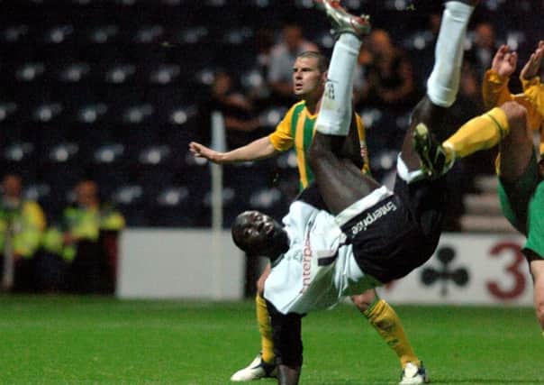 Patrick Agyemang turns upside down to fire Preston's winner against West Bromwich Albion with an overhead kick