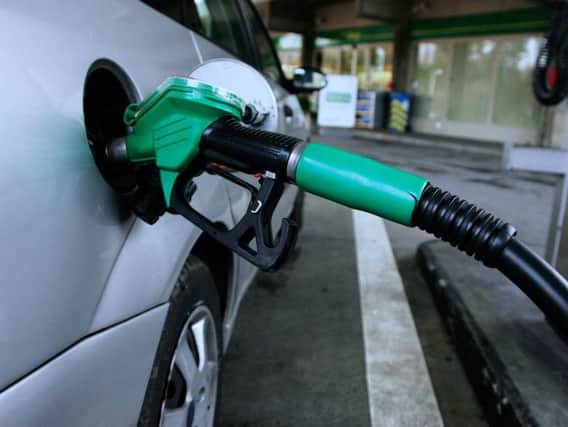 Asda cut petrol prices after fall in wholesale costs