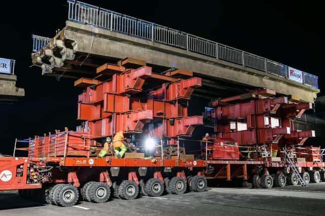 The centre section of the bridge is lifted clear