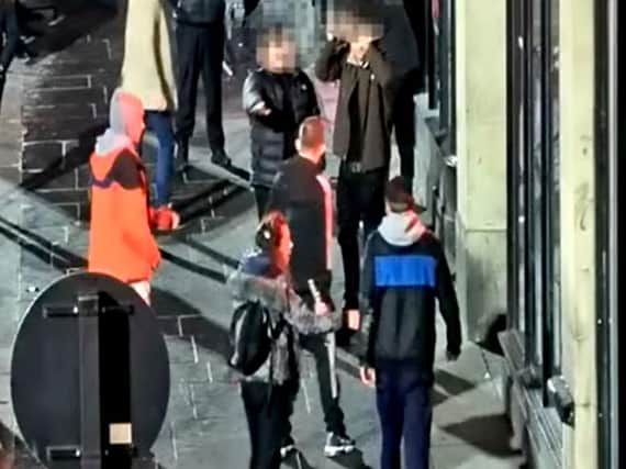 Kyle Morrow (centre), 19, who was jailed for two years at Newcastle Crown Court after attacking another man with nunchucks on March 9 outside Newcastles Bigg Market. Photo credit: Northumbria Police/PA Wire