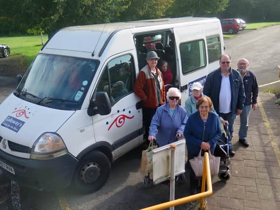 Galloway's members with one of the older minibuses