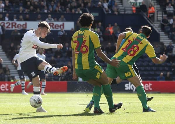 Brandon Barker has a shot charged down by West Bromwich Albion's Ahmed Hegazy and Gareth Barry