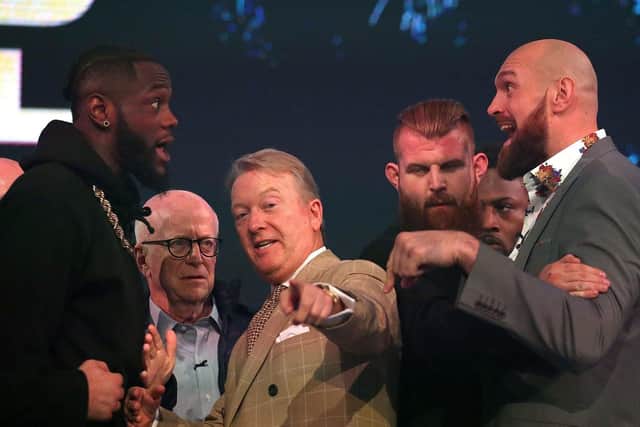 Tyson Fury and Deontay Wilder square off at Monday's press conference