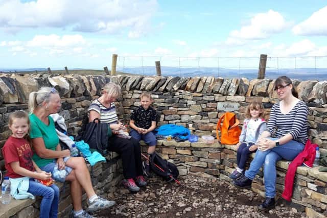 A new seating area has been built at the top of Pendle Hill by craftsman Phil Dolphin