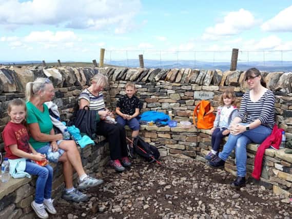A new seating area has been built at the top of Pendle Hill by craftsman Phil Dolphin