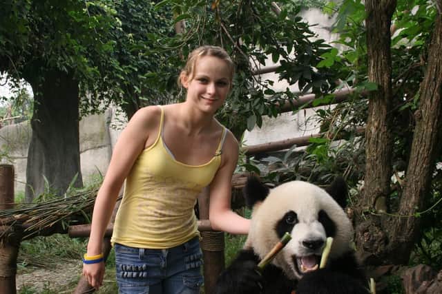 Sophie Ward visiting the pandas in Beijing at the age of 14