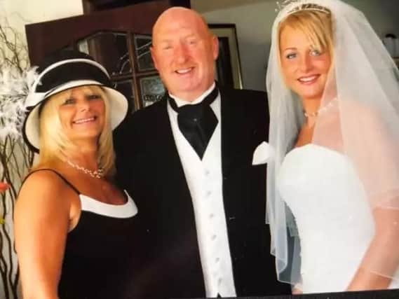 Kelly Ormerod is pictured on her wedding day with her proud parents, John and Susan Cooper, who died on their family holiday to Egypt in August.
