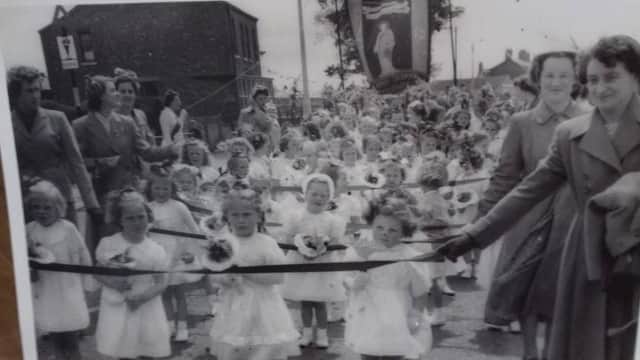 Judith Henderson is pictured third left at the front during a walking day with St John's Church in 1953.