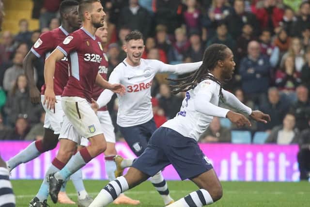 Daniel Johnson celebrates scoring Preston's first goal at Aston Villa