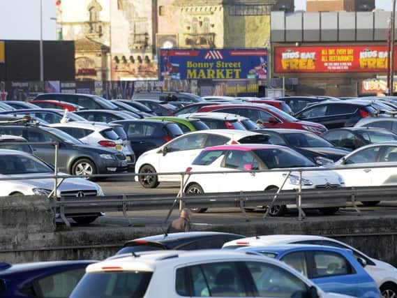 A reader writes about the size of parked cars