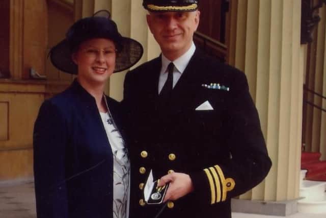 Simon Ryan and his wife Alison, when he received the Queens Volunteer Reserves Medal in 2005, during his time with the Royal Navy