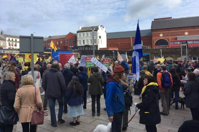 Protestors gather at Preston station. Photo: Helen Rimmer