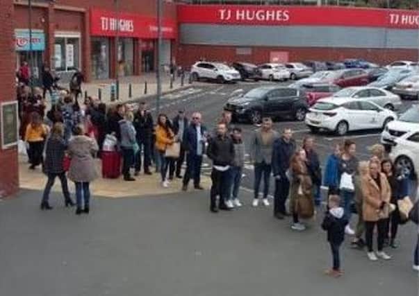 Queues wait to pay at the Fishergate shopping centre car park on Sunday
afternoon.