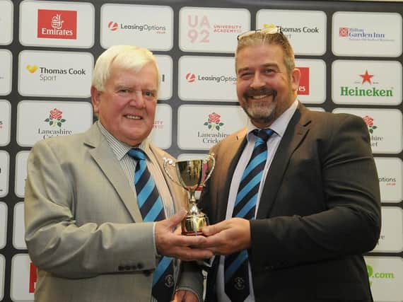 President Tom Haworth and vice-chairman Jim Blackhurst pick up Longridge's award as Lancashire County Club of the Year