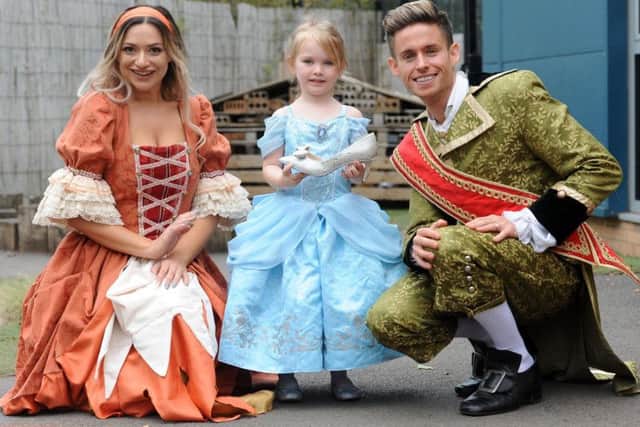 Jade Natalie as Cinderella and Carl Tracey as Prince Charming meet Little Rascals' own Cinders Matilda Bould
