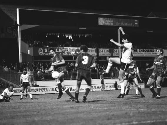 Peter Houghton has a shot in PNE's clash with Tranmere in September 1984