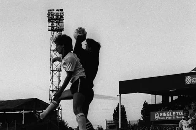 Dale Rudge climbs with the Tranmere keeper