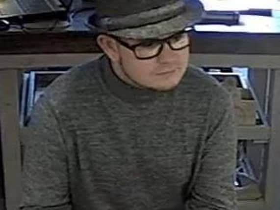 Police want to speak to this man in connection with several frauds in South Ribble pubs