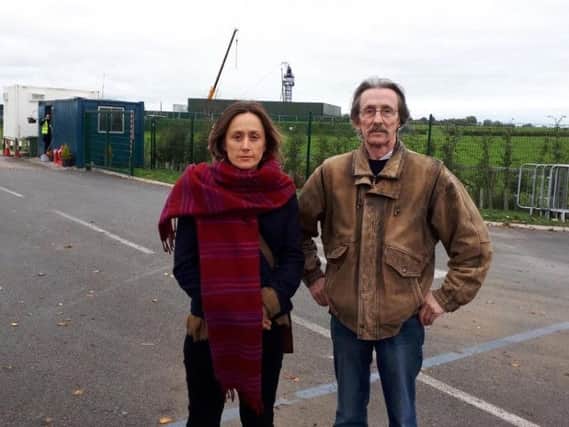 Bob Dennett and Helen Chuntso, who worked on the injunction bid to prevent Cuadrilla starting fracking, pictured outside the Preston New Road site.