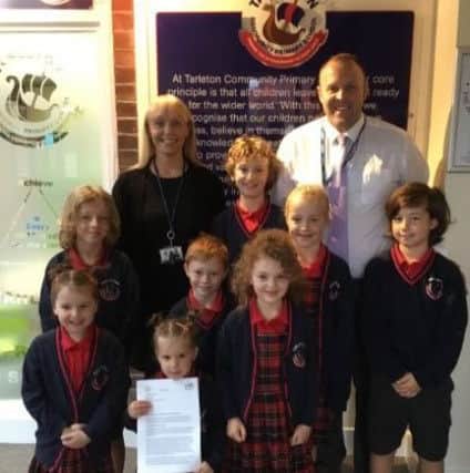 Tarleton Community Primary School headteacher Chris Upton  and deputy Janette Higson and some of the children.
