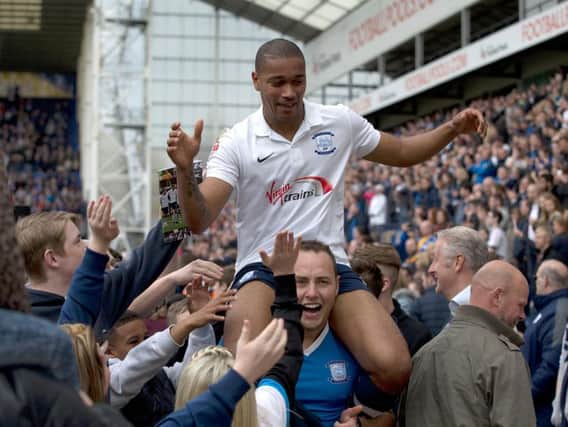 Chris Humphrey is carried off the Deepdale pitch by jubilant supporters after PNE's play-off semi-final victory against Chesterfield in May 2015
