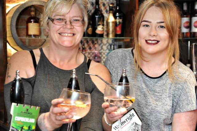 Picture by Julian Brown 12/10/18

The pub landladys, pictured left,  mother and daughter, Andrea and Shannon Brannelly

Offical reopening of The Plough, Chorley