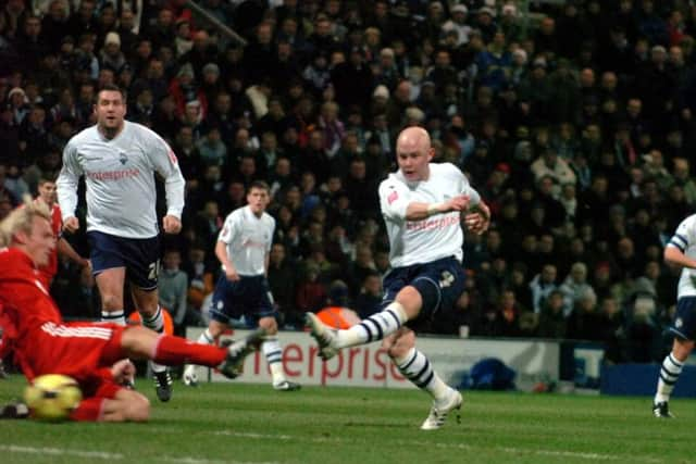 Richard Chaplow sees a shot blocked by Sami Hyppia