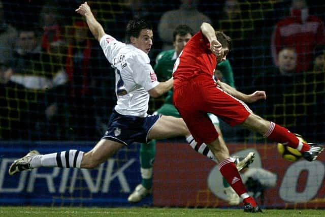 Sean St Ledger slides across to block Steven Gerrard's shot