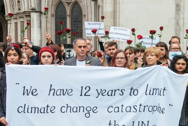 Protesters and supporters outside the Appeal Court in London for the appeal fo the three fracking protesters jailed in Preston for truck surfing at Cuadrilla's Preston New Road drill site near Little Plumpton