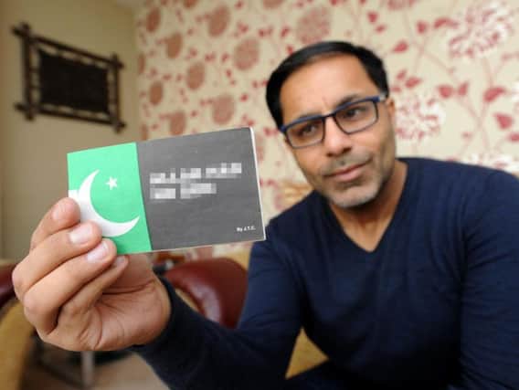 Pav Akhtar with the anti-Islam leaflet that was hand delivered to his home