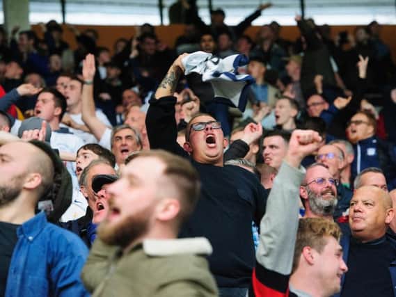 Preston North End fans celebrate Louis Moult's equaliser