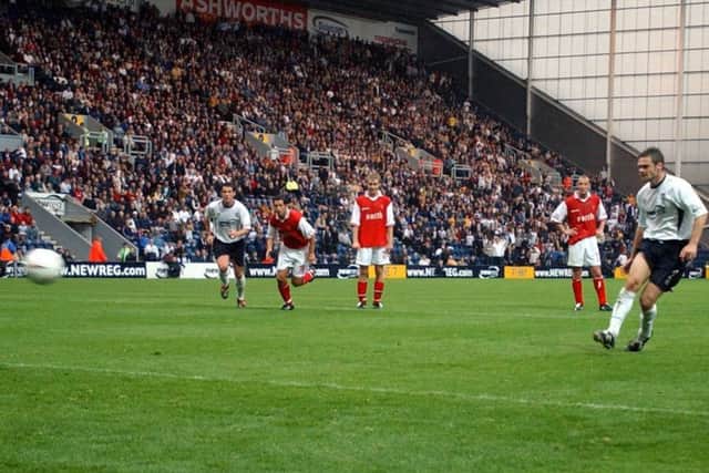 Graham Alexander scores his penalty against Rotherham United at Deepdale
