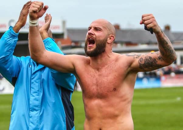 Chorley skipper Andy Teague celebrates the win over Barrow that set up the meeting with Doncaster. Picture: Stefan Willoughby