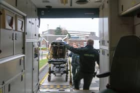 A shopper who collapsed in Home Bargains being helped into A&E at Blackpool Victoria Hospital