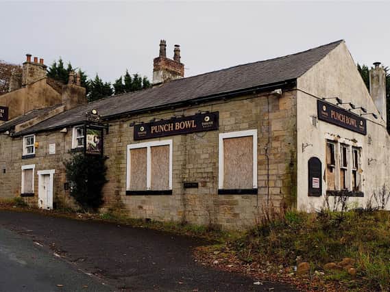 Derelict and vandalised - the former  Punch Bowl inn