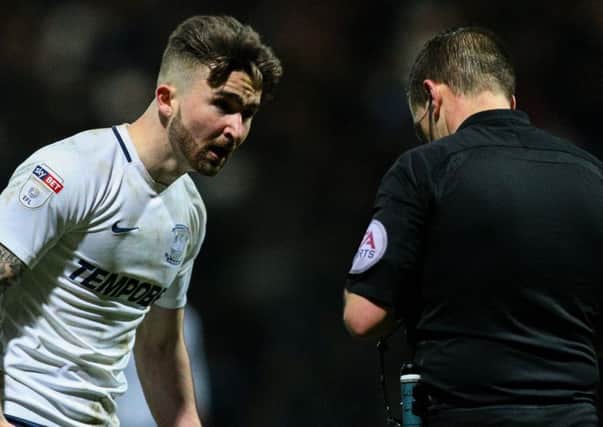 Preston North End's Sean Maguire has a word with referee Geoff Eltringham after he was booked for simulation in a game against Bristol City last season