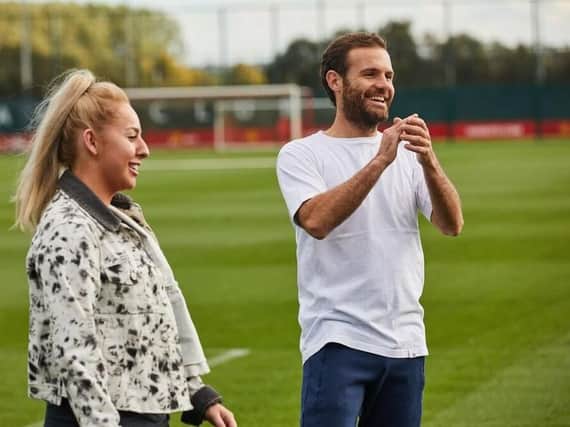 Liv Cooke is the first freestyle footballer to join Common Goal, an initiative looking to get footballers to give a percentage of their wage to football charities. Pictured Manchester United footballers Juan Mata - the founder of Common Goal - and Siobhan Chamberlain (Photos and video courtesy of Liv Cooke and Common Goal)