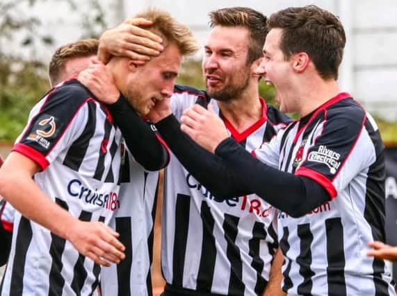 Chorley booked their place in the first round with a fine win over Barrow