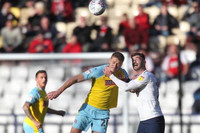 Andrew Hughes battles with Rotherham goalscorer Michael Smith