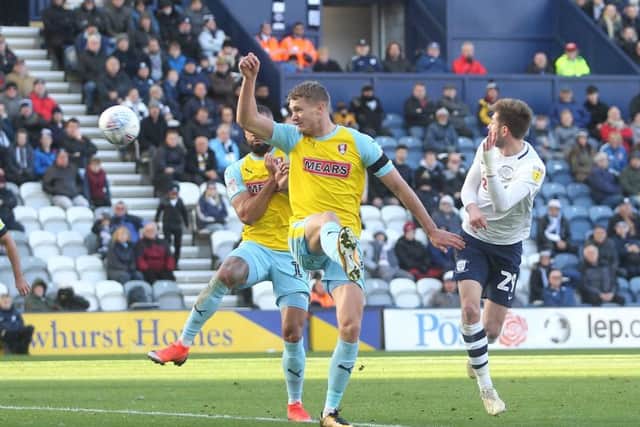 Tom Barkhuizen heads home the opening goal for Preston