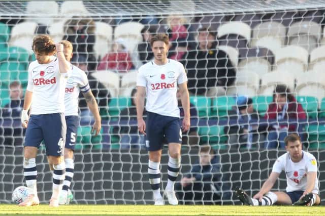 Preston North End's players look dejected after Michael Smith's equaliser for Rotherham